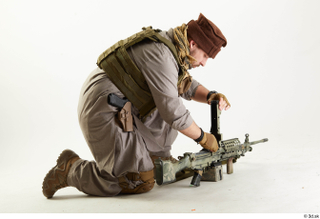 Photos Luis Donovan Army Taliban Gunner Poses charging gun kneeling…